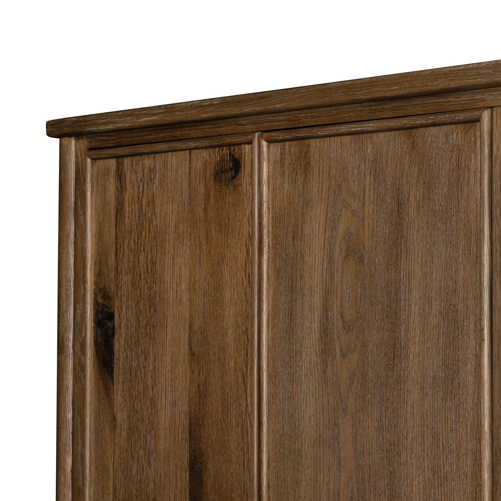 A classically constructed cabinet meets a clever storage solution. Two sets of large, flat-paneled doors conceal spacious shelves. Subtle hardware accents weathered oak. A design collaboration by Amber Lewis and Four Hands. This item has limited online distribution and may not be sold on websites without prior approval. Amethyst Home provides interior design, new home construction design consulting, vintage area rugs, and lighting in the Tampa metro area.