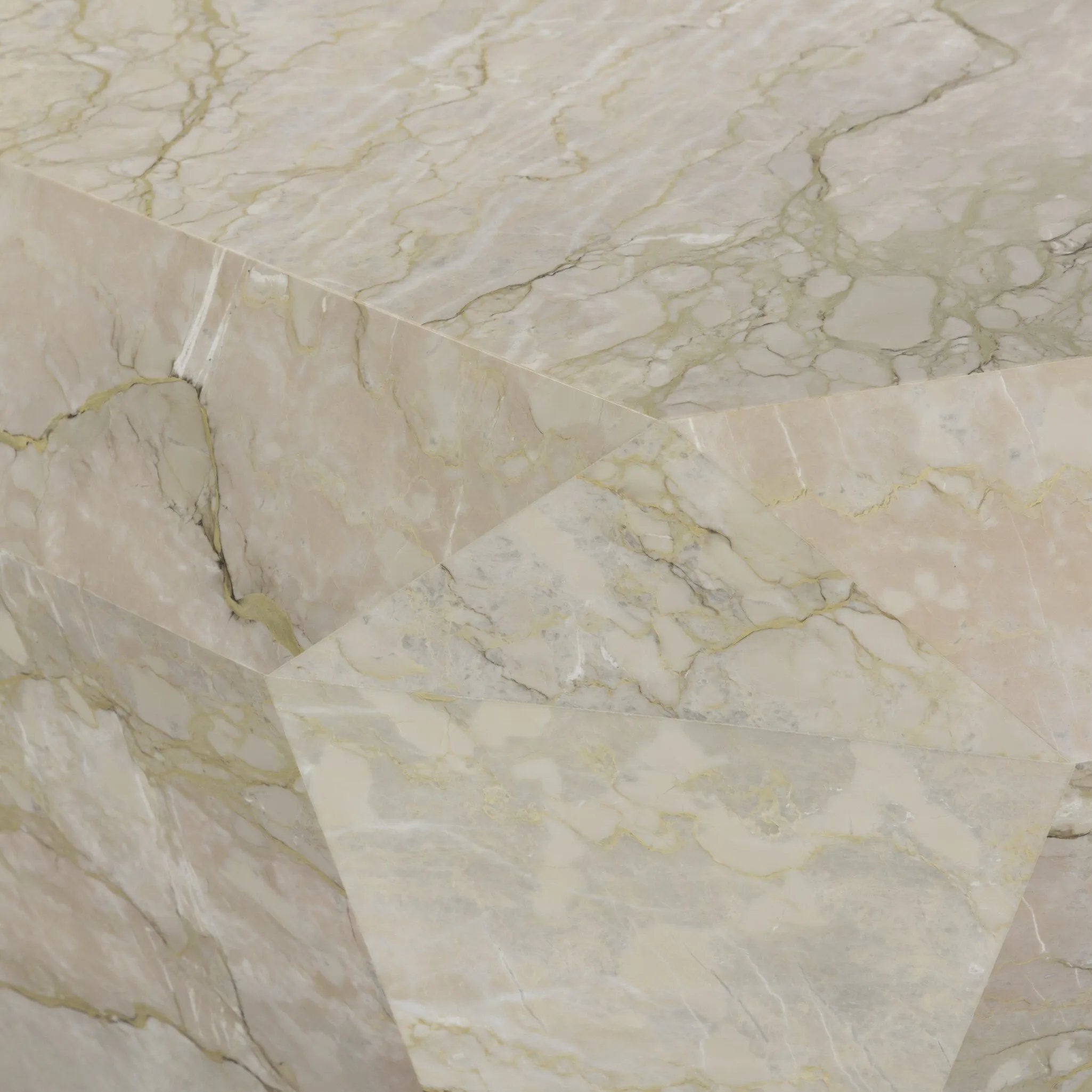 Finished in a unique sage green, a modern-minded end table of solid marble makes quite the statement in any space. Faceted for an extra angular look.As enthusiasts of luxe aesthetics at Amethyst, we love the warm modern inspired Basett End Table - Sage Green Marble. Amethyst Home provides interior design, new home construction design consulting, vintage area rugs, and lighting in the Calabasas metro area.