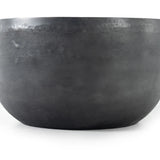 An aged grey finish highlights aluminum's natural depth, for a sleek, simple look with implied movement. Stylish indoors or out. Cover or store indoors during inclement weather and when not in use.As lovers of wabi sabi style at Amethyst, we love the warm modern inspired Basil Outdoor End Table - Aged Grey. Amethyst Home provides interior design, new home construction design consulting, vintage area rugs, and lighting in the Charlotte metro area.