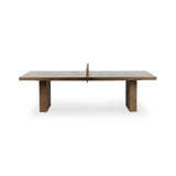 Fun meets flexibility. Two large slabs of warm grey marble, framed in rich oak, join together and sit atop the minimalist plinth bases of this dual-purpose ping pong table. The wooden "net" fastens to the table with custom gunmetal clamps, which can be easily removed for a dining table that seats 12 Amethyst Home provides interior design, new home construction design consulting, vintage area rugs, and lighting in the Des Moines metro area.