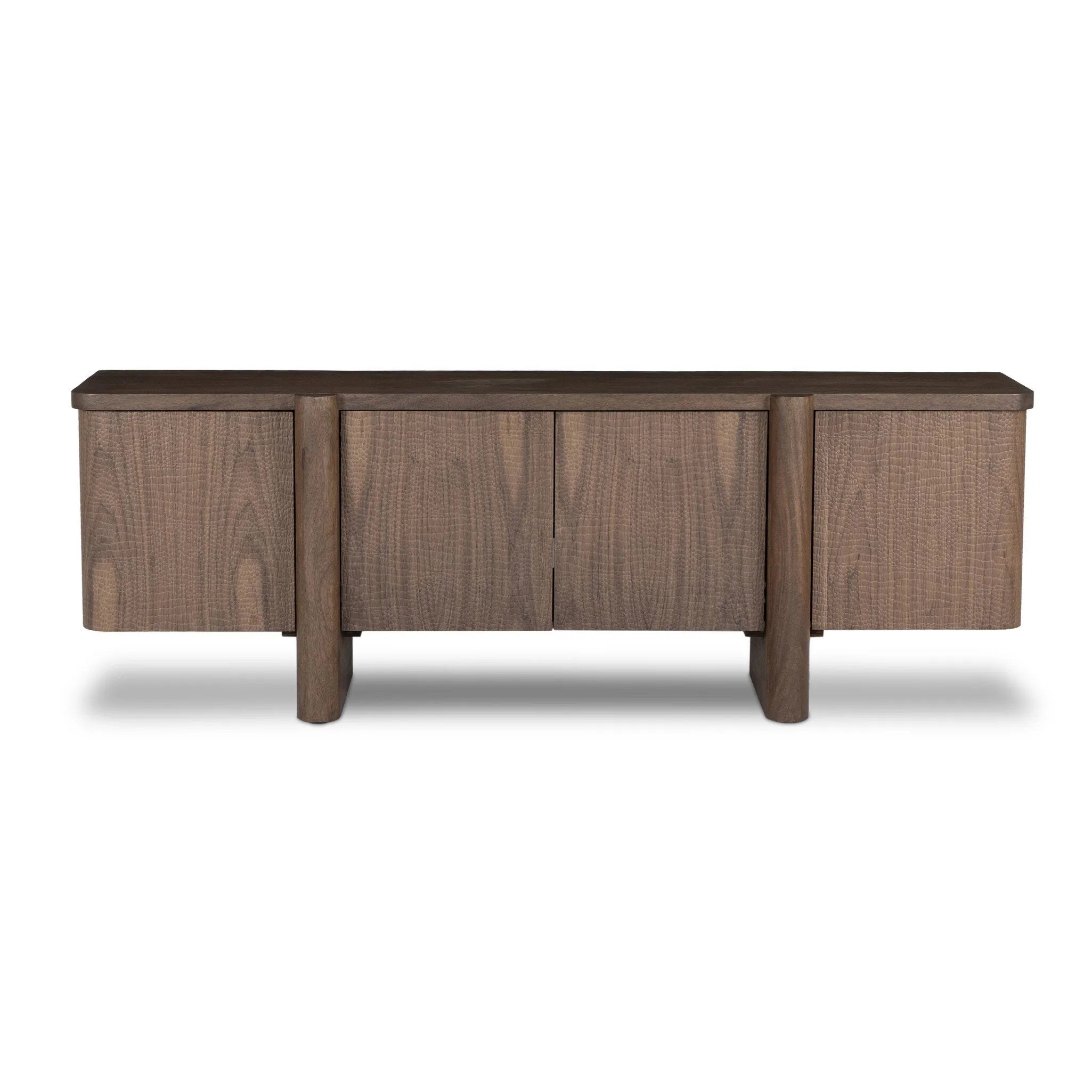 This unique, texture-driven piece offers an updated take on classic crocodile. Made from weathered solid mango, with embossed walnut door fronts. A subtly softened profile balances chunky legs, with bullnose details completing the look. Amethyst Home provides interior design, new home construction design consulting, vintage area rugs, and lighting in the Portland metro area.