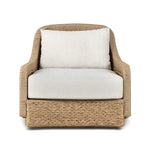 For a casual, coastal vibe, this outdoor chair takes on the classic slipper silhouette with added dimension and movement atop a 360-swivel base. It's all about the heavy braided weave technique: Faux banana leaf comes together in a mix of weave formats for added visual interest, finishing with a cord wrap detail on the arms. Amethyst Home provides interior design, new home construction design consulting, vintage area rugs, and lighting in the Newport Beach metro area.
