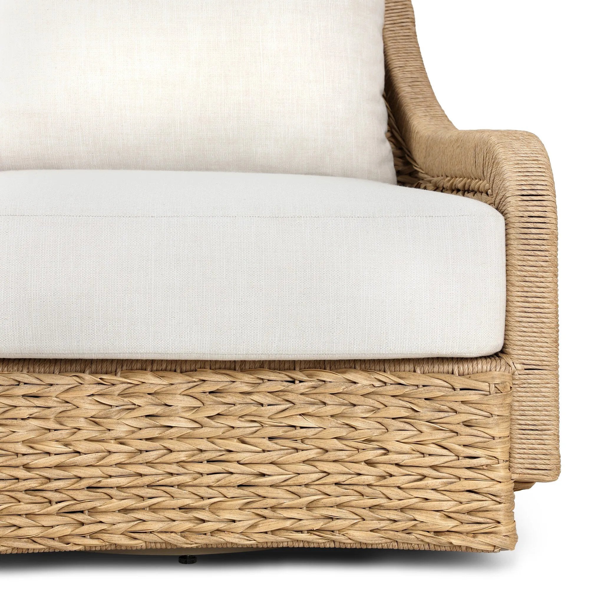For a casual, coastal vibe, this outdoor chair takes on the classic slipper silhouette with added dimension and movement atop a 360-swivel base. It's all about the heavy braided weave technique: Faux banana leaf comes together in a mix of weave formats for added visual interest, finishing with a cord wrap detail on the arms. Amethyst Home provides interior design, new home construction design consulting, vintage area rugs, and lighting in the Portland metro area.