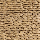 For a casual, coastal vibe, this outdoor chair takes on the classic slipper silhouette with added dimension and movement atop a 360-swivel base. It's all about the heavy braided weave technique: Faux banana leaf comes together in a mix of weave formats for added visual interest, finishing with a cord wrap detail on the arms. Amethyst Home provides interior design, new home construction design consulting, vintage area rugs, and lighting in the Seattle metro area.