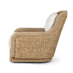 For a casual, coastal vibe, this outdoor chair takes on the classic slipper silhouette with added dimension and movement atop a 360-swivel base. It's all about the heavy braided weave technique: Faux banana leaf comes together in a mix of weave formats for added visual interest, finishing with a cord wrap detail on the arms. Amethyst Home provides interior design, new home construction design consulting, vintage area rugs, and lighting in the Tampa metro area.
