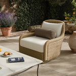 For a casual, coastal vibe, this outdoor chair takes on the classic slipper silhouette with added dimension and movement atop a 360-swivel base. It's all about the heavy braided weave technique: Faux banana leaf comes together in a mix of weave formats for added visual interest, finishing with a cord wrap detail on the arms. Amethyst Home provides interior design, new home construction design consulting, vintage area rugs, and lighting in the Winter Garden metro area.
