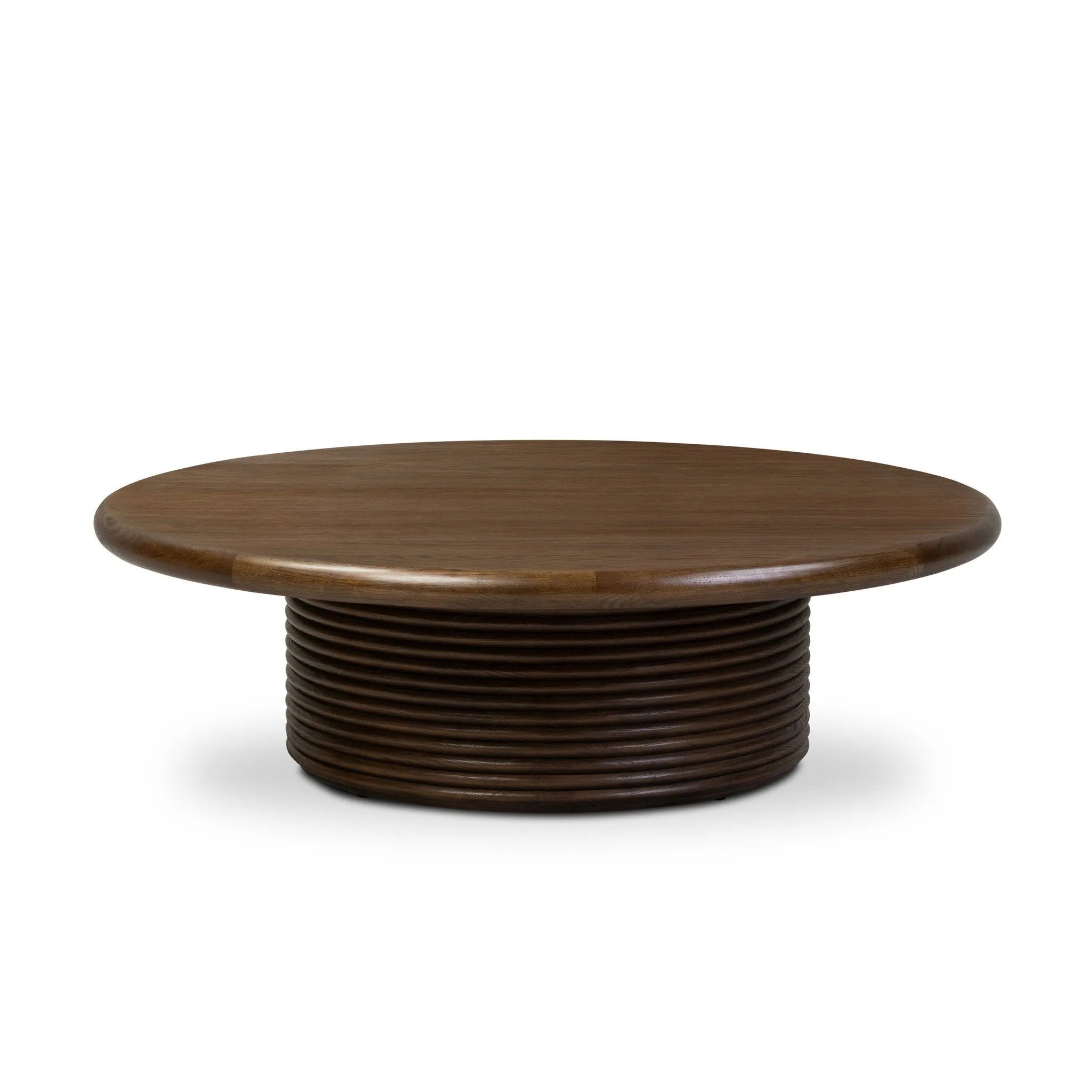 With soft, contemporary shaping, this coffee table crafted of spiced oak features stacked, channeled reeding on the base for a look of fluid movement.As lovers of clean aesthetics at Amethyst, we love the nature inspired Benny Coffee Table - Spiced Oak. This item pairs well with other brands such as Verellen and is perfect for wabi sabi homes Amethyst Home provides interior design, new home construction design consulting, vintage area rugs, and lighting in the Salt Lake City metro area.