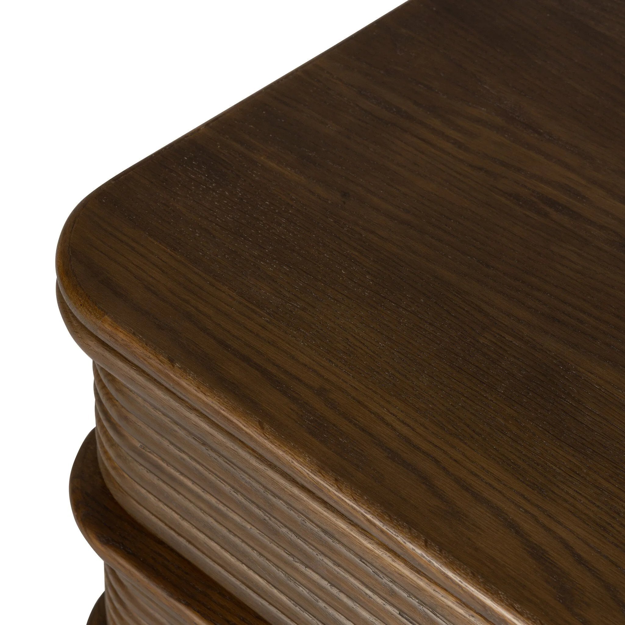 Inspired by aerodynamic-inspired Streamline Moderne style, stacked scalloped reeding wraps this spiced oak nightstand. The result: a beautifully rhythmic, repeated look. With integrated hardware for a clean finish.As lovers of modern aesthetics at Amethyst, we love the warm modern inspired Benny Nightstand - Spiced Oak Veneer. Amethyst Home provides interior design, new home construction design consulting, vintage area rugs, and lighting in the Laguna Beach metro area.