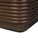Inspired by aerodynamic-inspired Streamline Moderne style, stacked scalloped reeding wraps this spiced oak nightstand. The result: a beautifully rhythmic, repeated look. With integrated hardware for a clean finish.As lovers of modern aesthetics at Amethyst, we love the warm modern inspired Benny Nightstand - Spiced Oak Veneer. Amethyst Home provides interior design, new home construction design consulting, vintage area rugs, and lighting in the San Diego metro area.