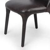 Featuring Bensen Sonoma Black Dining Chair by Four Hands at Amethyst Home. Experience the ultimate dining comfort with the Bensen Sonoma Black Dining Chair. Designed for both style and comfort, this chair features a sleek black design that will elevate any dining space. With its sturdy construction and ergonomic design, you can enjoy every meal in pure re. Amethyst Home provides interior design, new home construction design consulting, vintage area rugs, and lighting in the Kansas City metro area.