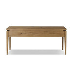 Featuring Bergstrom Warm Natural Oak Veneer Desk by Four Hands at Amethyst Home. Warm up your workspace with this light-finished writing desk of rich character oak. Tapered legs and subtle corner relief details create a simplified look that complements a home office or flex space. Complete with thoughtful touches like built-in cord management, a flip-t. Amethyst Home provides interior design, new home construction design consulting, vintage area rugs, and lighting in the Salt Lake City metro area.