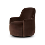 Compact and cozy, this high-back swivel chair with pillow-formed arms features contrast piping outlining its silhouette. Velvety performance fabric in a deep brown hue offers maximum comfort. The base is affixed to a 360-degree swivel for relaxed lounging. Amethyst Home provides interior design, new home construction design consulting, vintage area rugs, and lighting in the Los Angeles metro area.