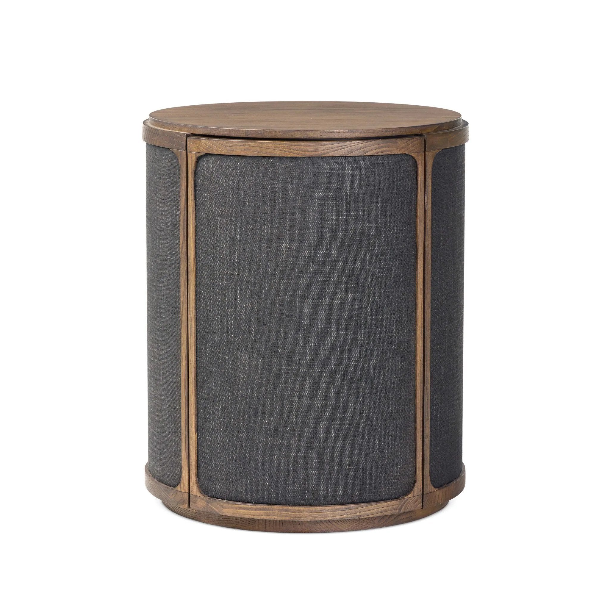 A balance of materials and shape, texture and detail. Warm sungkai wood frames lacquered, black linen side panels. A hidden door opens to interior storage, finishing off this design-forward coffee table with a clever touch.As lovers of wabi sabi materials at Amethyst, we love the designer inspired Bertie End Table. Amethyst Home provides interior design, new home construction design consulting, vintage area rugs, and lighting in the Boston metro area.