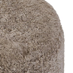 For an extra seat or propped feet, this welcoming ottoman features a subtly tapered shape and a rounded base with bun feet beneath. Crafted from solid oak and upholstered with taupe shearling for extra texture Amethyst Home provides interior design, new home construction design consulting, vintage area rugs, and lighting in the Des Moines metro area.