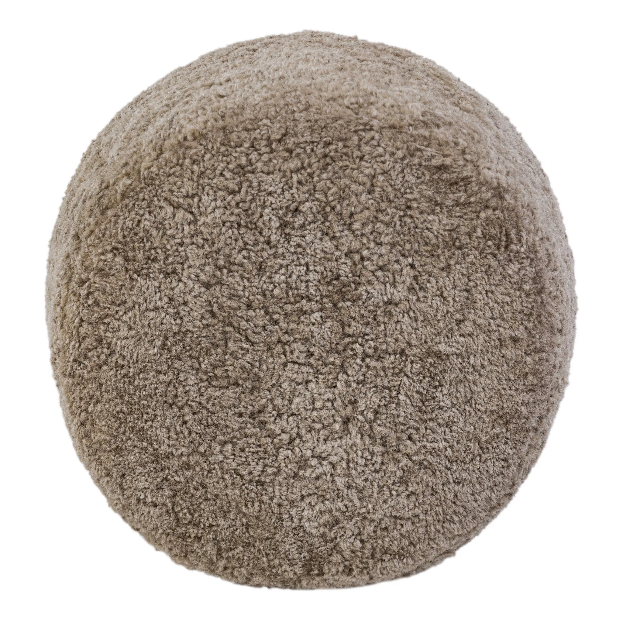 For an extra seat or propped feet, this welcoming ottoman features a subtly tapered shape and a rounded base with bun feet beneath. Crafted from solid oak and upholstered with taupe shearling for extra texture Amethyst Home provides interior design, new home construction design consulting, vintage area rugs, and lighting in the Nashville metro area.