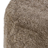 For an extra seat or propped feet, this welcoming ottoman features a subtly tapered shape and a rounded base with bun feet beneath. Crafted from solid oak and upholstered with taupe shearling for extra texture Amethyst Home provides interior design, new home construction design consulting, vintage area rugs, and lighting in the Portland metro area.