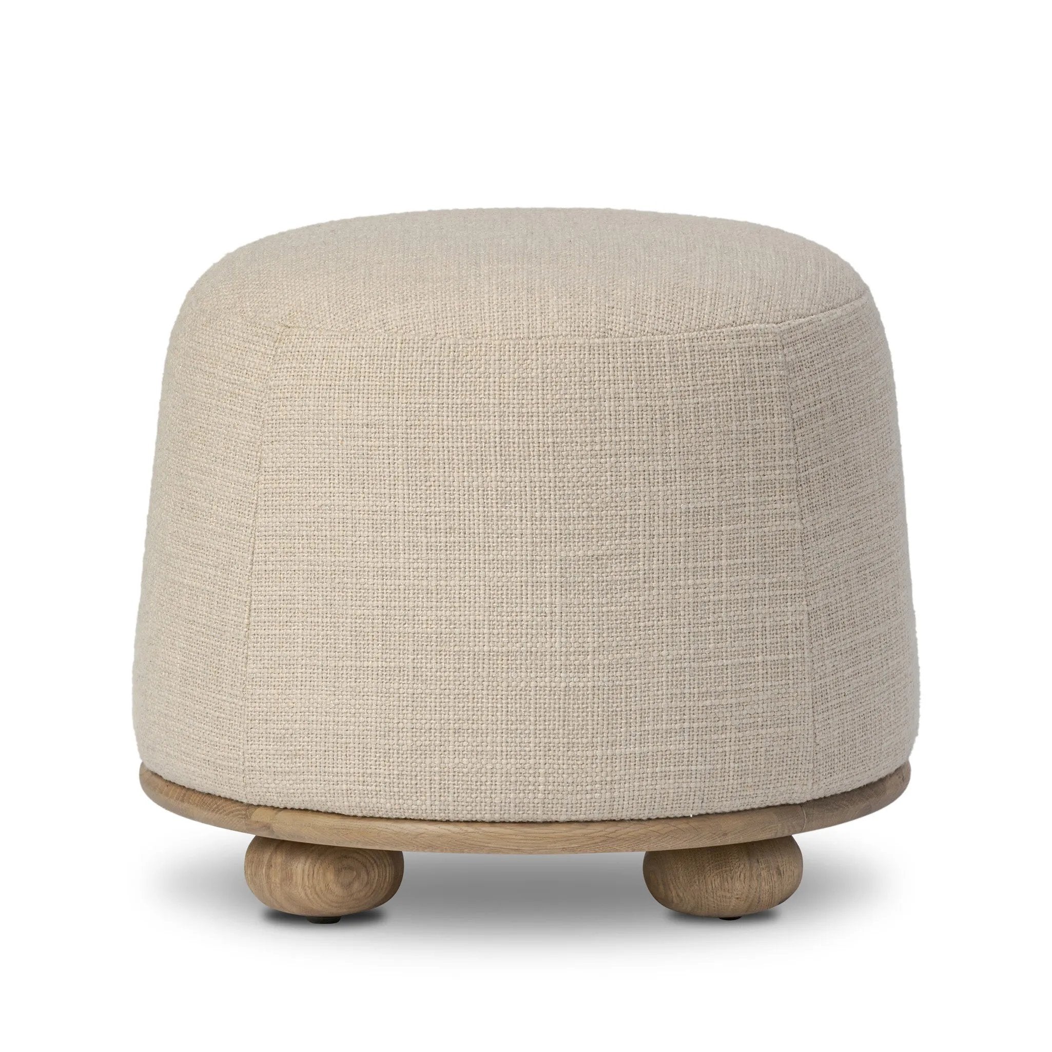 For an extra seat or propped feet, this welcoming ottoman features a subtly tapered shape and a rounded base with oak bun feet beneath. Crafted with soft foam cushioning and upholstered in a poly/wool blend fabric Amethyst Home provides interior design, new home construction design consulting, vintage area rugs, and lighting in the Houston metro area.