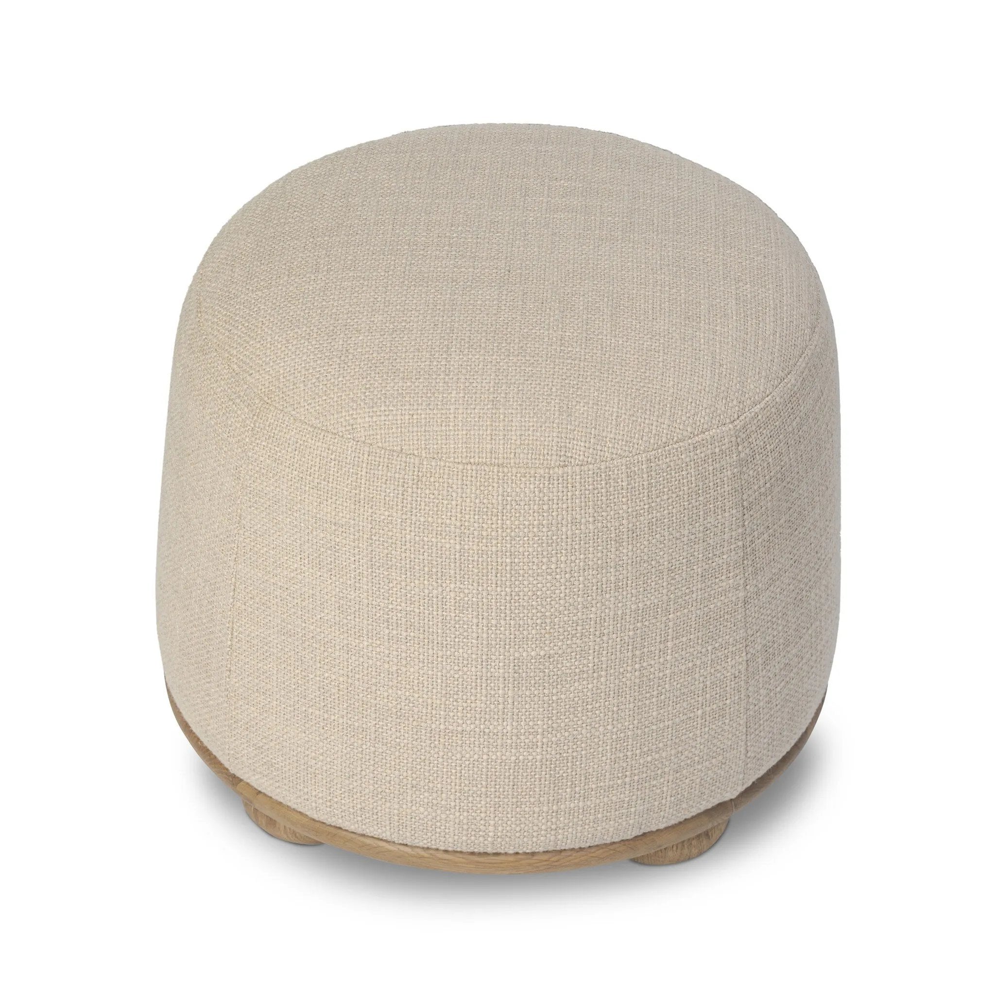 For an extra seat or propped feet, this welcoming ottoman features a subtly tapered shape and a rounded base with oak bun feet beneath. Crafted with soft foam cushioning and upholstered in a poly/wool blend fabric Amethyst Home provides interior design, new home construction design consulting, vintage area rugs, and lighting in the Laguna Beach metro area.