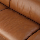 A low-slung and layered design inspired by mid-century Italian seating. The sofa balances a slim metal frame with a voluminous feather-blended interior wrapped in top-grain leather that only gets better with age.As enthusiasts of luxe style at Amethyst, we love the nature inspired Blaine Sofa -96" - Lorento Cognac. Amethyst Home provides interior design, new home construction design consulting, vintage area rugs, and lighting in the Park City metro area.