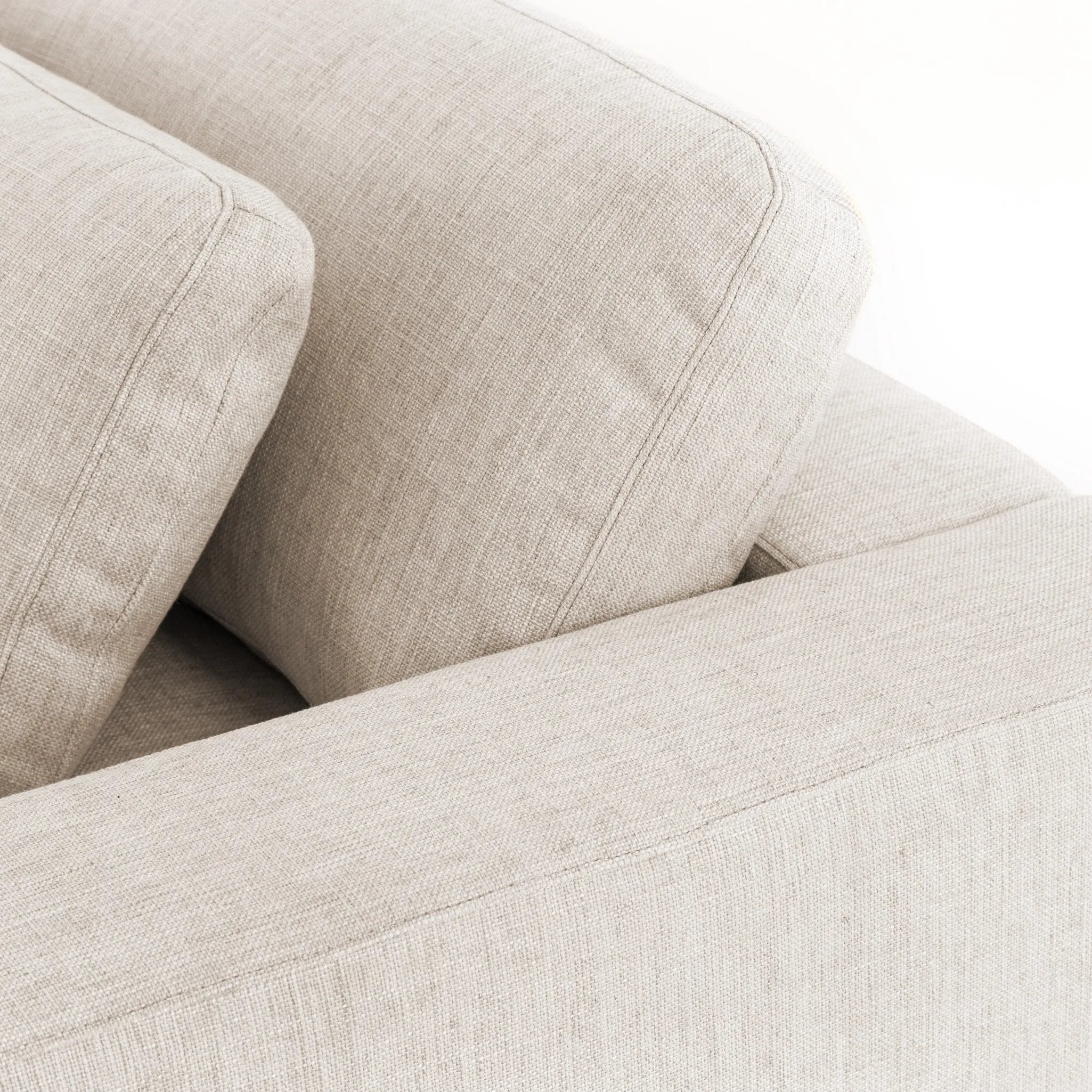 Featuring Bloor Essence Natural Sofa by Four Hands at Amethyst Home. Deep, modern and seductive. This dramatic, spacious sofa is covered in a durable light neutral woven fabric that mixes well with any color palette.Overall Dimensions: 98.00"w x 46.00"d x 31.00"hMaterials : 49% Viscose (Rayon), 22% Flax/Linen, 18% Polyester, 11% CottonWeight : 154.32 lbs. Amethyst Home provides interior design, new home construction design consulting, vintage area rugs, and lighting in the Nashville metro area.