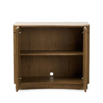 Fluid contours give shape to this solid mindi cabinet, topped with a creamy marbled top. Two doors with knobbed pulls open to inset shelves for organized storage Amethyst Home provides interior design, new home construction design consulting, vintage area rugs, and lighting in the Des Moines metro area.