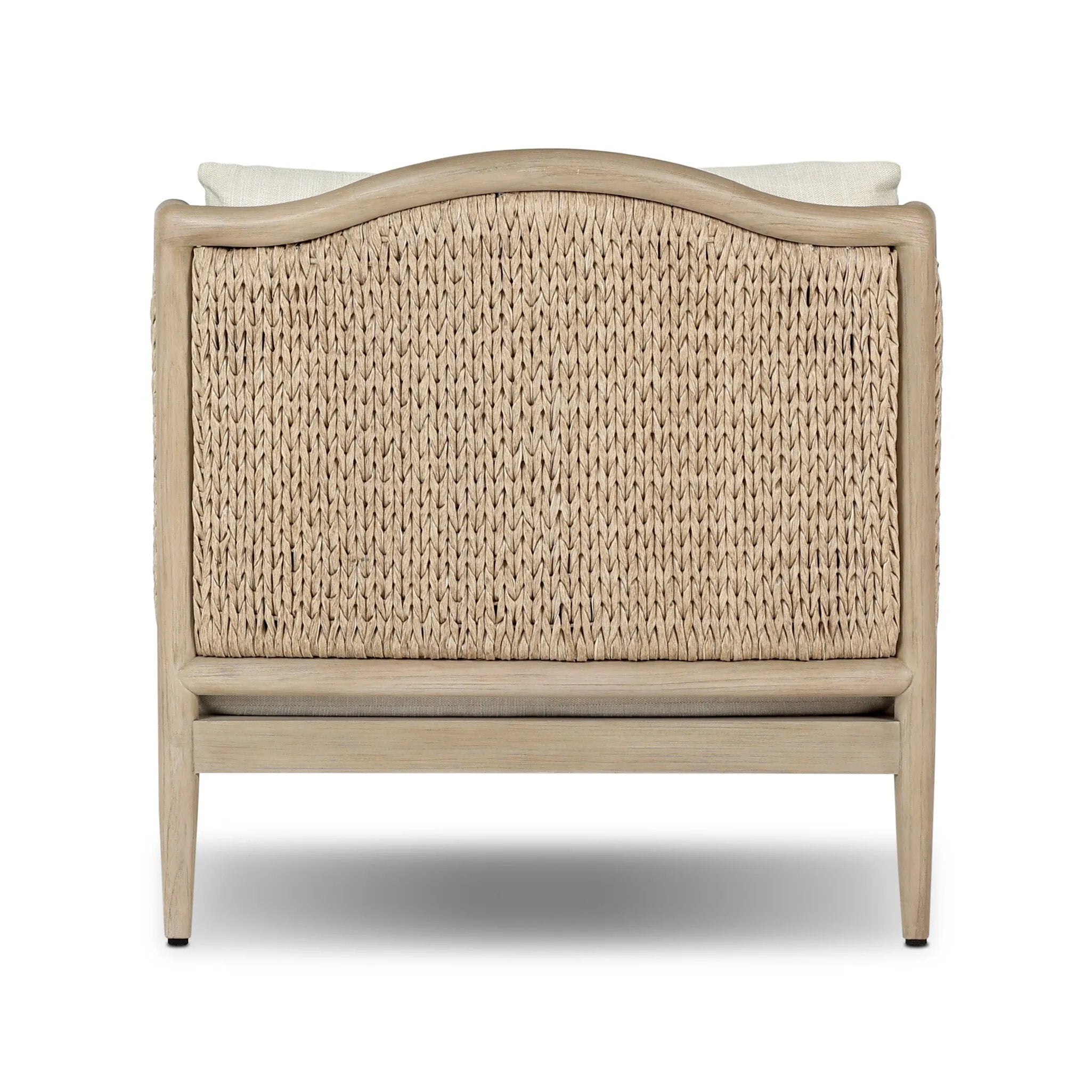 A fresh take on the traditional, this outdoor chair reimagines classic silhouettes with faux banana leaf panels bringing heavy texture to the frame. The camel back and swooping curves add softness, with removable cushions in a linen-like fabric adding comfort. Cover or store inside during inclement weather and when not in use. Amethyst Home provides interior design, new home construction design consulting, vintage area rugs, and lighting in the Charlotte metro area.