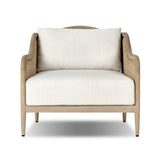 A fresh take on the traditional, this outdoor chair reimagines classic silhouettes with faux banana leaf panels bringing heavy texture to the frame. The camel back and swooping curves add softness, with removable cushions in a linen-like fabric adding comfort. Cover or store inside during inclement weather and when not in use. Amethyst Home provides interior design, new home construction design consulting, vintage area rugs, and lighting in the Kansas City metro area.