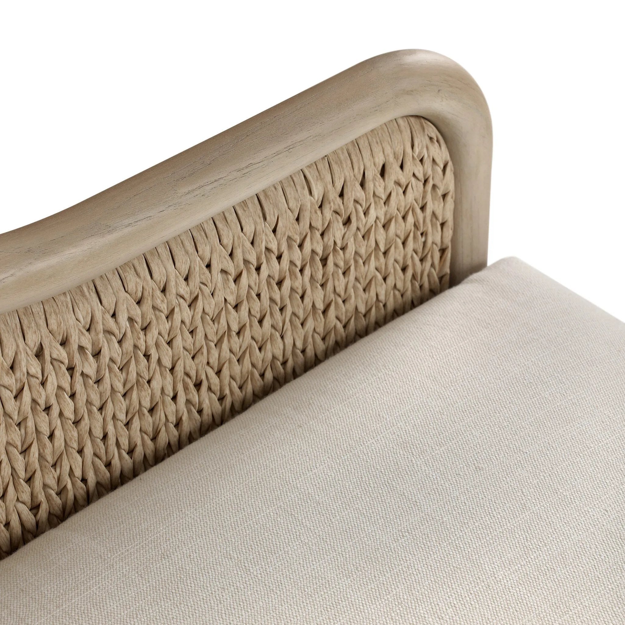 A fresh take on the traditional, this outdoor chair reimagines classic silhouettes with faux banana leaf panels bringing heavy texture to the frame. The camel back and swooping curves add softness, with removable cushions in a linen-like fabric adding comfort. Cover or store inside during inclement weather and when not in use. Amethyst Home provides interior design, new home construction design consulting, vintage area rugs, and lighting in the Park City metro area.