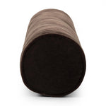 A long, chocolate-colored bolster pillow elevates beds and sofas in an instant. Crafted from saturated wool velvet, for a sustainable alternative to mohair, with a hidden zipper for a smooth silhouette Amethyst Home provides interior design, new home construction design consulting, vintage area rugs, and lighting in the Miami metro area.