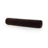 A long, chocolate-colored bolster pillow elevates beds and sofas in an instant. Crafted from saturated wool velvet, for a sustainable alternative to mohair, with a hidden zipper for a smooth silhouette Amethyst Home provides interior design, new home construction design consulting, vintage area rugs, and lighting in the Newport Beach metro area.