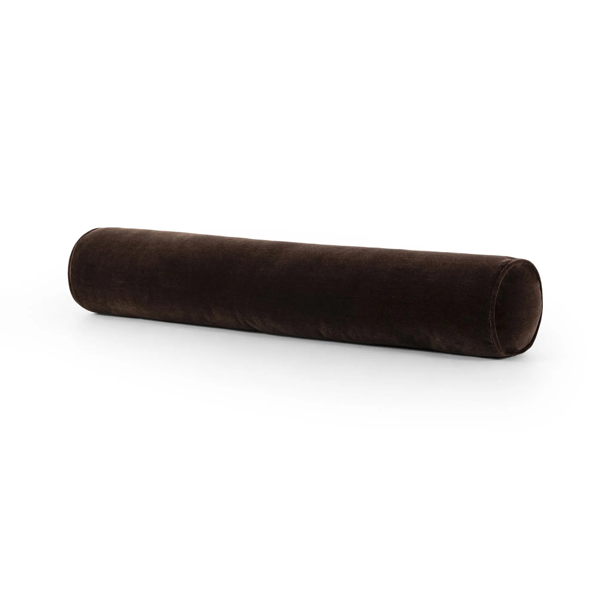 A long, chocolate-colored bolster pillow elevates beds and sofas in an instant. Crafted from saturated wool velvet, for a sustainable alternative to mohair, with a hidden zipper for a smooth silhouette Amethyst Home provides interior design, new home construction design consulting, vintage area rugs, and lighting in the Newport Beach metro area.