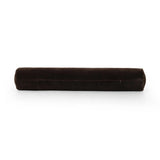 A long, chocolate-colored bolster pillow elevates beds and sofas in an instant. Crafted from saturated wool velvet, for a sustainable alternative to mohair, with a hidden zipper for a smooth silhouette Amethyst Home provides interior design, new home construction design consulting, vintage area rugs, and lighting in the San Diego metro area.