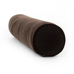 A long, chocolate-colored bolster pillow elevates beds and sofas in an instant. Crafted from saturated wool velvet, for a sustainable alternative to mohair, with a hidden zipper for a smooth silhouette Amethyst Home provides interior design, new home construction design consulting, vintage area rugs, and lighting in the Washington metro area.