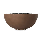 This outdoor fire table is a welcoming centerpiece designed for gathering. Made from glass-reinforced concrete, each piece is naturally finished with deep tones of pewter and dark grey. The bowl shape is completed with lavastones in the center, bringing together a bold, monochromatic look. Amethyst Home provides interior design, new home construction design consulting, vintage area rugs, and lighting in the Washington metro area.