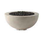 This outdoor fire table is a welcoming centerpiece designed for gathering. Made from glass-reinforced concrete, each piece is naturally finished with subtle tones of grey and cream. The bowl shape is completed with lavastones in the center, bringing together a bold, monochromatic look. Amethyst Home provides interior design, new home construction design consulting, vintage area rugs, and lighting in the Nashville metro area.