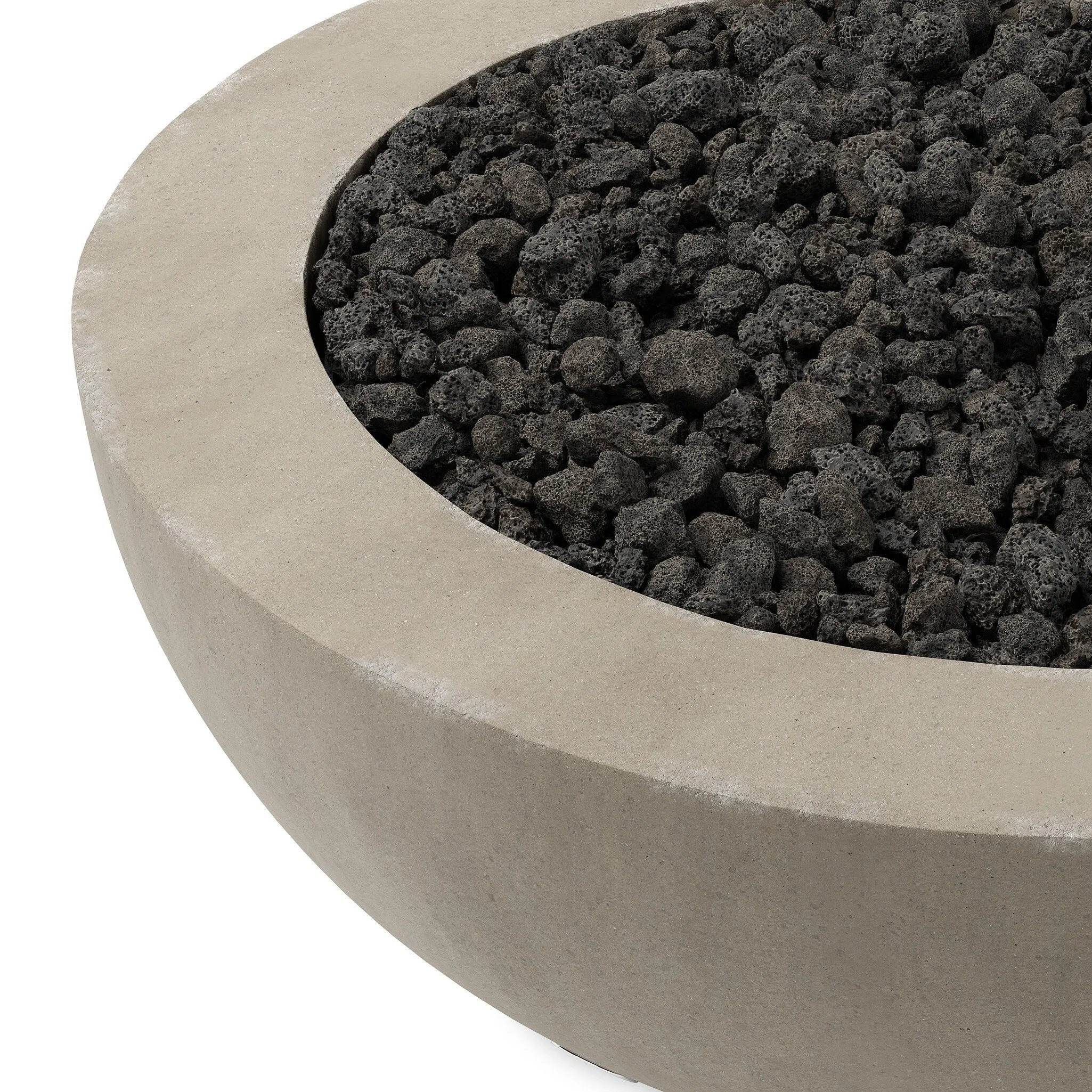 This outdoor fire table is a welcoming centerpiece designed for gathering. Made from glass-reinforced concrete, each piece is naturally finished with subtle tones of grey and cream. The bowl shape is completed with lavastones in the center, bringing together a bold, monochromatic look. Amethyst Home provides interior design, new home construction design consulting, vintage area rugs, and lighting in the San Diego metro area.