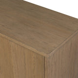 The traditional media console, reimagined. This warm oak piece features two sets of doors with shallow scalloping that draws the eye, providing a subtle visual flow. Rear cutouts for cord management.As lovers of natural aesthetics at Amethyst, we love the designer inspired Brookhurst Media Console - Drifted Oak Veneer. Amethyst Home provides interior design, new home construction design consulting, vintage area rugs, and lighting in the Austin metro area.