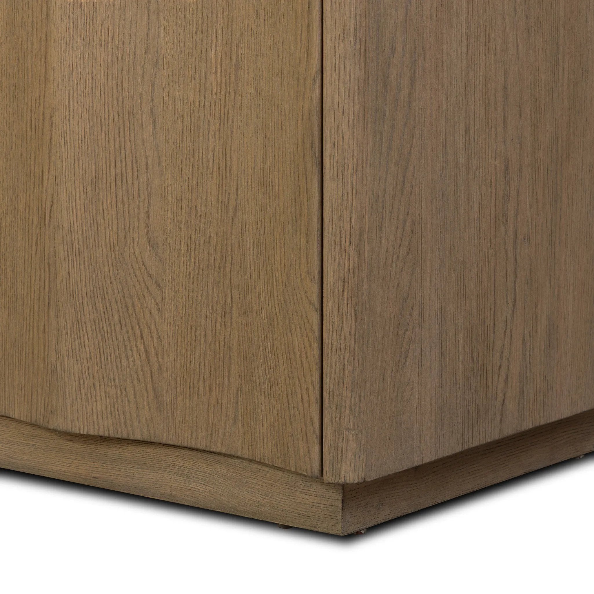 The traditional media console, reimagined. This warm oak piece features two sets of doors with shallow scalloping that draws the eye, providing a subtle visual flow. Rear cutouts for cord management.As lovers of natural aesthetics at Amethyst, we love the designer inspired Brookhurst Media Console - Drifted Oak Veneer. Amethyst Home provides interior design, new home construction design consulting, vintage area rugs, and lighting in the Winter Garden metro area.