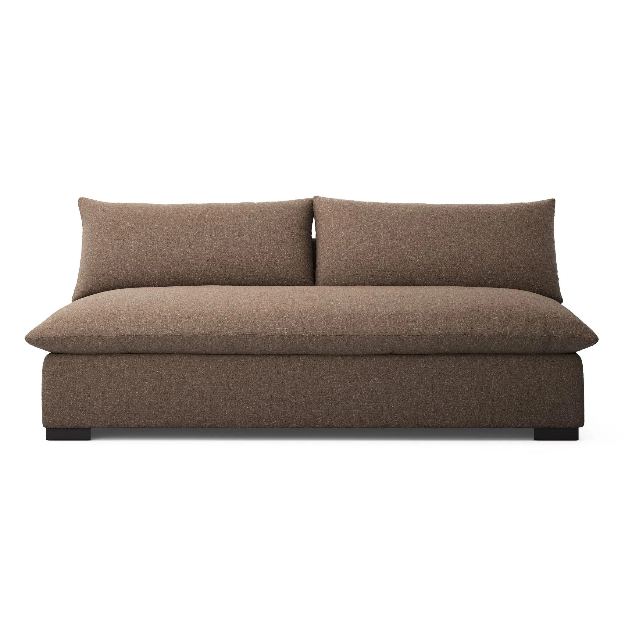 Welcome to the modern lounging essential. The sofa piece to a simplified sectional is upholstered in a soft, high-performance fabric in an inviting coffee hue. Performance fabrics are specially created to withstand spills, stains, high traffic and wear, ensuring long-term comfort and unmatched durability Amethyst Home provides interior design, new home construction design consulting, vintage area rugs, and lighting in the Newport Beach metro area.