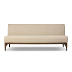 This timeless piece works seamlessly into a wide range of styles and collections. With tapered wooden legs with a small curve detail and an armless silhouette for ease and flexibility around a dining banquette. Upholstered in a beautifully neutral performance fabric, connected with alligator clips at the bottom. Amethyst Home provides interior design, new home construction design consulting, vintage area rugs, and lighting in the Des Moines metro area.