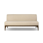 This timeless piece works seamlessly into a wide range of styles and collections. With tapered wooden legs with a small curve detail and an armless silhouette for ease and flexibility around a dining banquette. Upholstered in a beautifully neutral performance fabric, connected with alligator clips at the bottom. Amethyst Home provides interior design, new home construction design consulting, vintage area rugs, and lighting in the Monterey metro area.