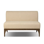 This timeless piece works seamlessly into a wide range of styles and collections. With tapered wooden legs with a small curve detail and an armless silhouette for ease and flexibility around a dining banquette. Upholstered in a beautifully neutral performance fabric, connected with alligator clips at the bottom. Amethyst Home provides interior design, new home construction design consulting, vintage area rugs, and lighting in the San Diego metro area.
