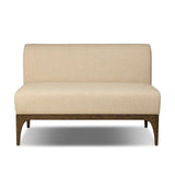 This timeless piece works seamlessly into a wide range of styles and collections. With tapered wooden legs with a small curve detail and an armless silhouette for ease and flexibility around a dining banquette. Upholstered in a beautifully neutral performance fabric, connected with alligator clips at the bottom. Amethyst Home provides interior design, new home construction design consulting, vintage area rugs, and lighting in the San Diego metro area.