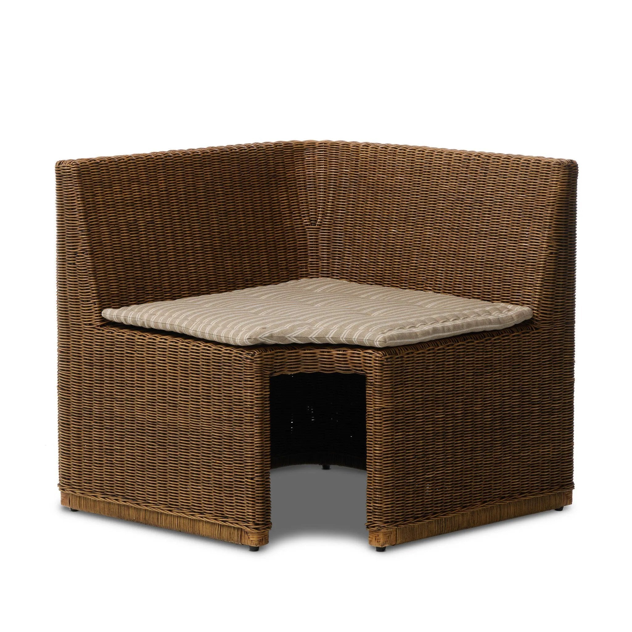 Antique-inspired coastal style. Rattan introduces varying natural shades and texture to this dining bench, and the frame's soft lines and beige and white striped fabric cushion invite a comfortable sit. Option to style alone or pair with other pieces in the collection. A design collaboration by Amber Lewis and Four Hands. Amethyst Home provides interior design, new home construction design consulting, vintage area rugs, and lighting in the Alpharetta metro area.