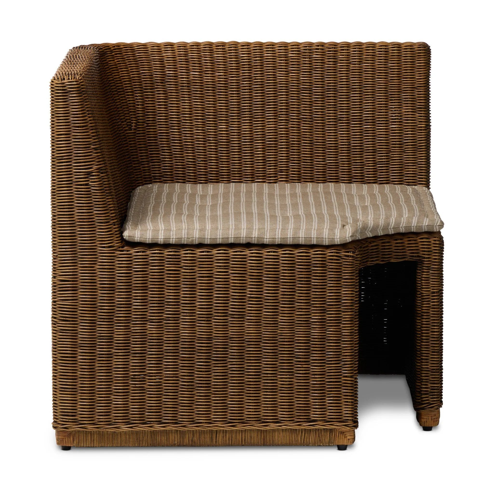Antique-inspired coastal style. Rattan introduces varying natural shades and texture to this dining bench, and the frame's soft lines and beige and white striped fabric cushion invite a comfortable sit. Option to style alone or pair with other pieces in the collection. A design collaboration by Amber Lewis and Four Hands. Amethyst Home provides interior design, new home construction design consulting, vintage area rugs, and lighting in the Houston metro area.