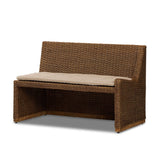 Antique-inspired coastal style. Rattan introduces varying natural shades and texture to this dining bench, and the frame's soft lines and beige and white striped fabric cushion invite a comfortable sit. Option to style alone or pair with other pieces in the collection. A design collaboration by Amber Lewis and Four Hands. Amethyst Home provides interior design, new home construction design consulting, vintage area rugs, and lighting in the Seattle metro area.