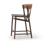 Featuring Buxton Natural Paper Rush Bar + Counter Stool by Four Hands at Amethyst Home. A solid oak counter stool defined by tapered legs and framing gives an updated look to the classic whistler chair. Finished with a paper rush wrapped detail on the back.BarOverall Dimensions: 19.25"w x 22.25"d x 42.75"hWeight: 23.70 lbsCounterOverall Dimensions: 19.50"w. Amethyst Home provides interior design, new home construction design consulting, vintage area rugs, and lighting in the Alpharetta metro area.