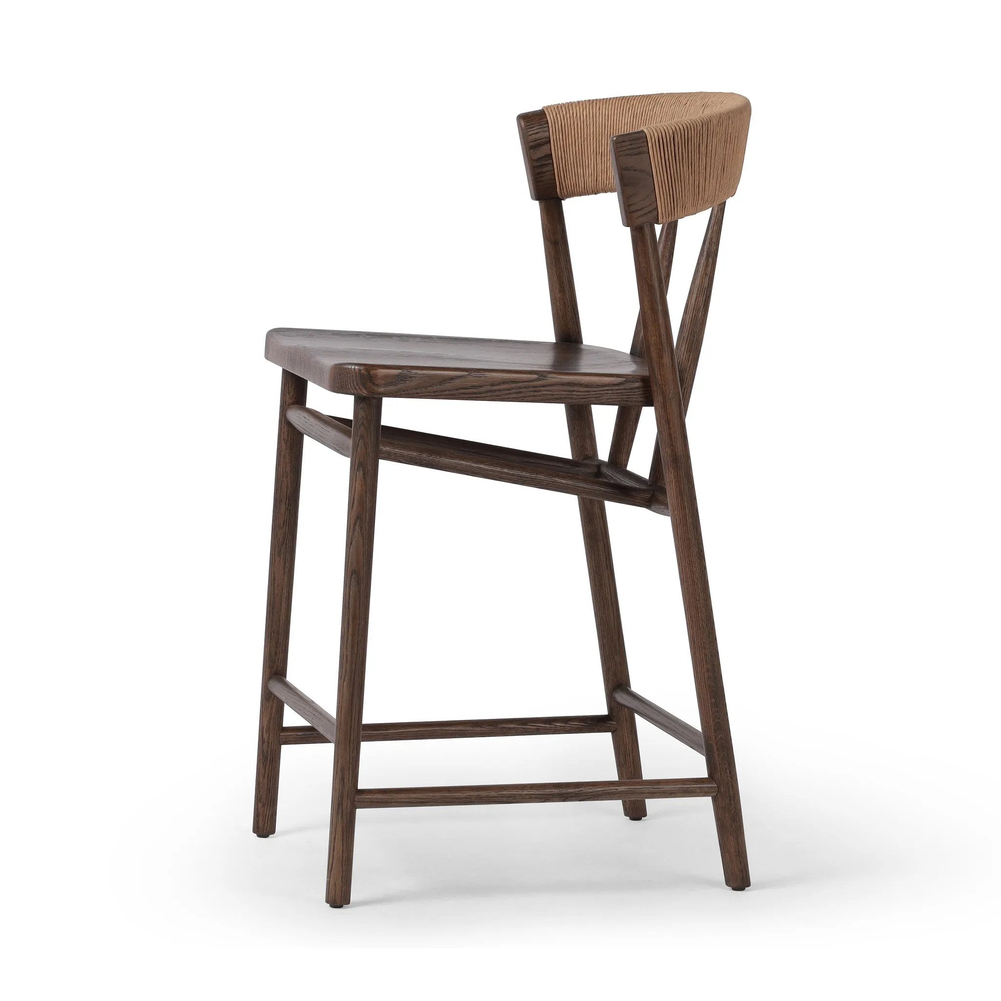 Featuring Buxton Natural Paper Rush Bar + Counter Stool by Four Hands at Amethyst Home. A solid oak counter stool defined by tapered legs and framing gives an updated look to the classic whistler chair. Finished with a paper rush wrapped detail on the back.BarOverall Dimensions: 19.25"w x 22.25"d x 42.75"hWeight: 23.70 lbsCounterOverall Dimensions: 19.50"w. Amethyst Home provides interior design, new home construction design consulting, vintage area rugs, and lighting in the Alpharetta metro area.