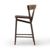 Featuring Buxton Natural Paper Rush Bar + Counter Stool by Four Hands at Amethyst Home. A solid oak counter stool defined by tapered legs and framing gives an updated look to the classic whistler chair. Finished with a paper rush wrapped detail on the back.BarOverall Dimensions: 19.25"w x 22.25"d x 42.75"hWeight: 23.70 lbsCounterOverall Dimensions: 19.50"w . Amethyst Home provides interior design, new home construction design consulting, vintage area rugs, and lighting in the Calabasas metro area.