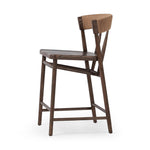 Featuring Buxton Natural Paper Rush Bar + Counter Stool by Four Hands at Amethyst Home. A solid oak counter stool defined by tapered legs and framing gives an updated look to the classic whistler chair. Finished with a paper rush wrapped detail on the back.BarOverall Dimensions: 19.25"w x 22.25"d x 42.75"hWeight: 23.70 lbsCounterOverall Dimensions: 19.50". Amethyst Home provides interior design, new home construction design consulting, vintage area rugs, and lighting in the Kansas City metro area.